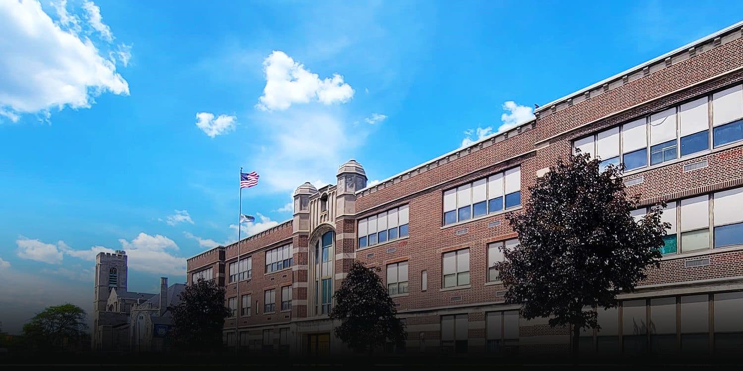 Front of the Barber Preparatory Academy brick school building in Highland Park, Michigan.