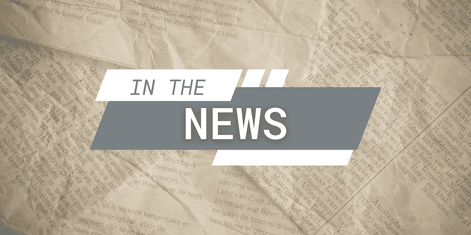 Overlay with "IN THE NEWS" text on a newspaper background.