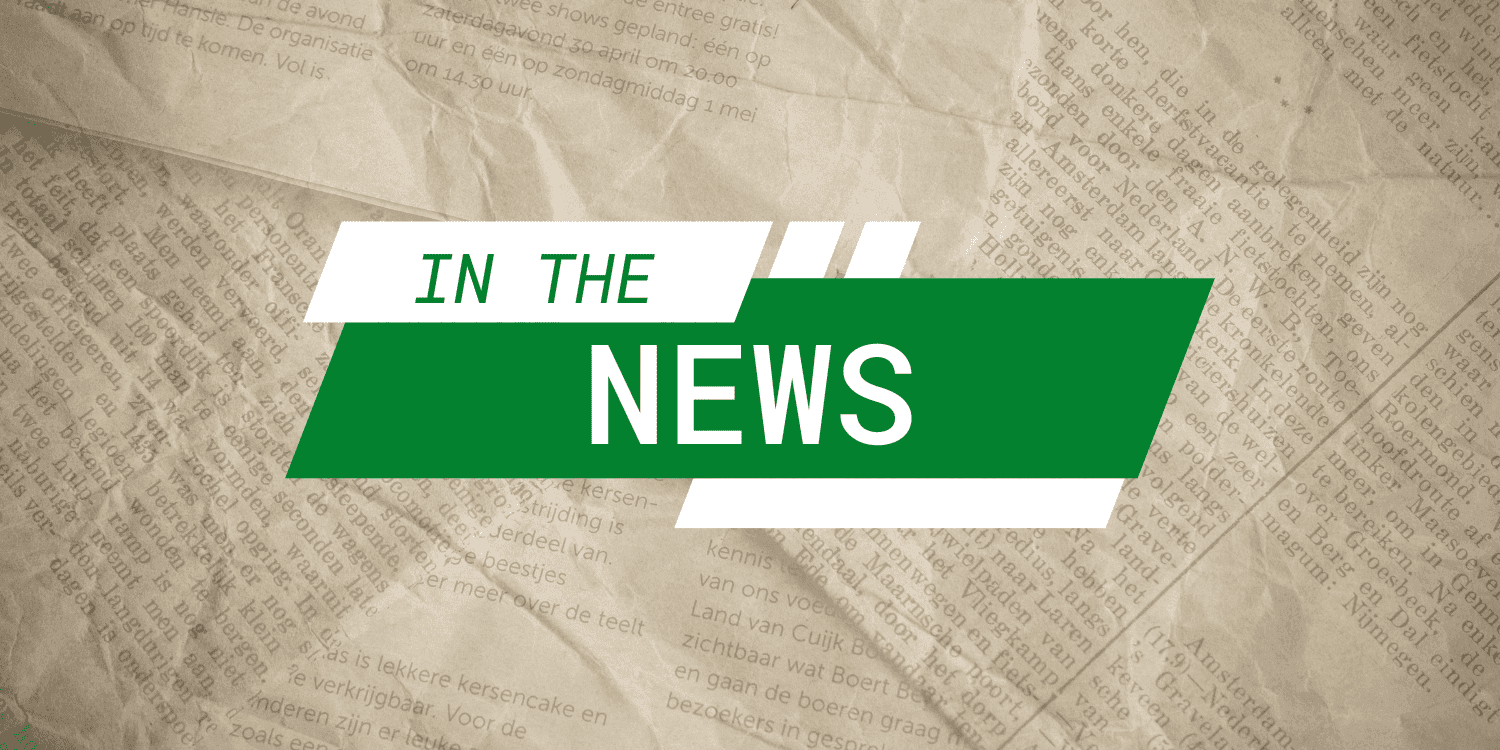Graphic overlay "IN THE NEWS" on newspaper.