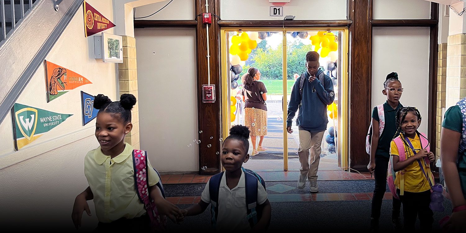 Students walking through the hallway