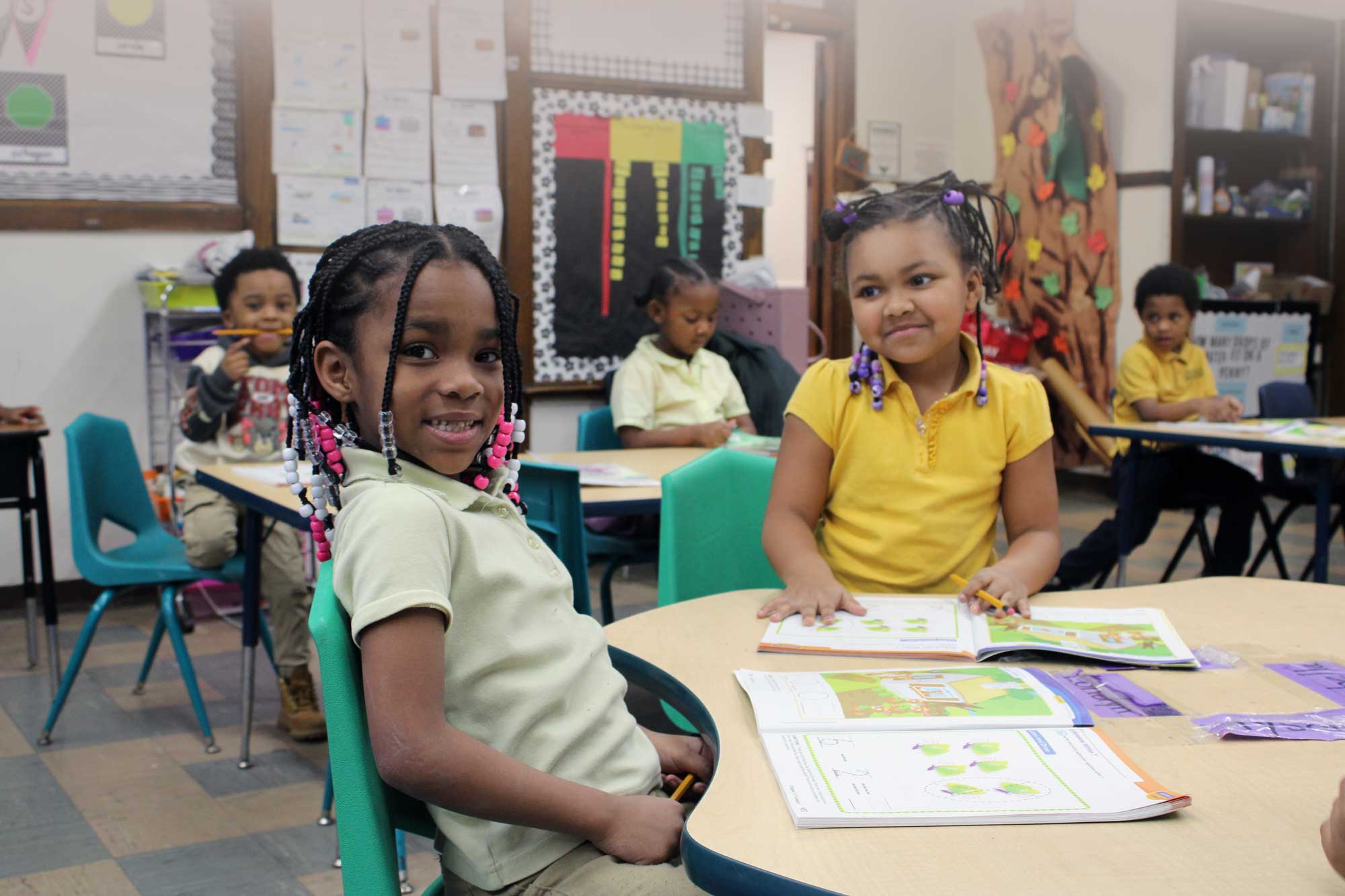Two students working together in class